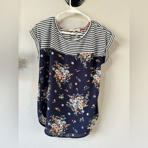 Striped navy blue and cream colored shirt with sheer flower bottom.